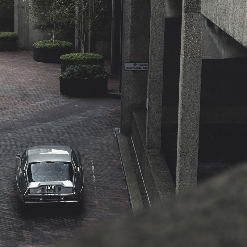 European Noir: A Citroën SM Skates Through The Shadows Of The Barbican Centre
