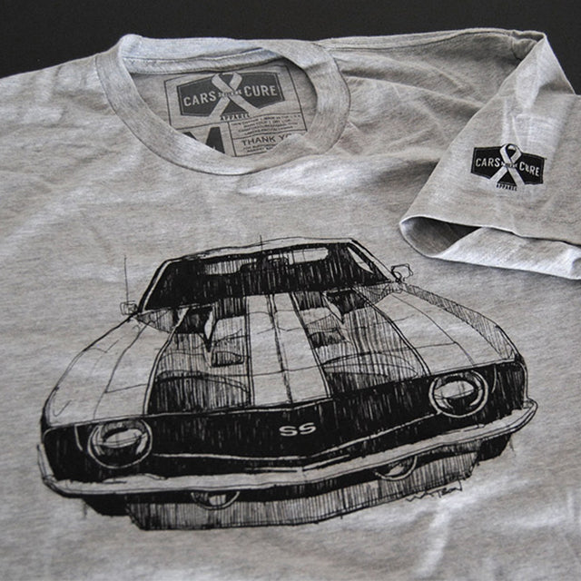 Battling Cancer, One Car Shirt At A Time